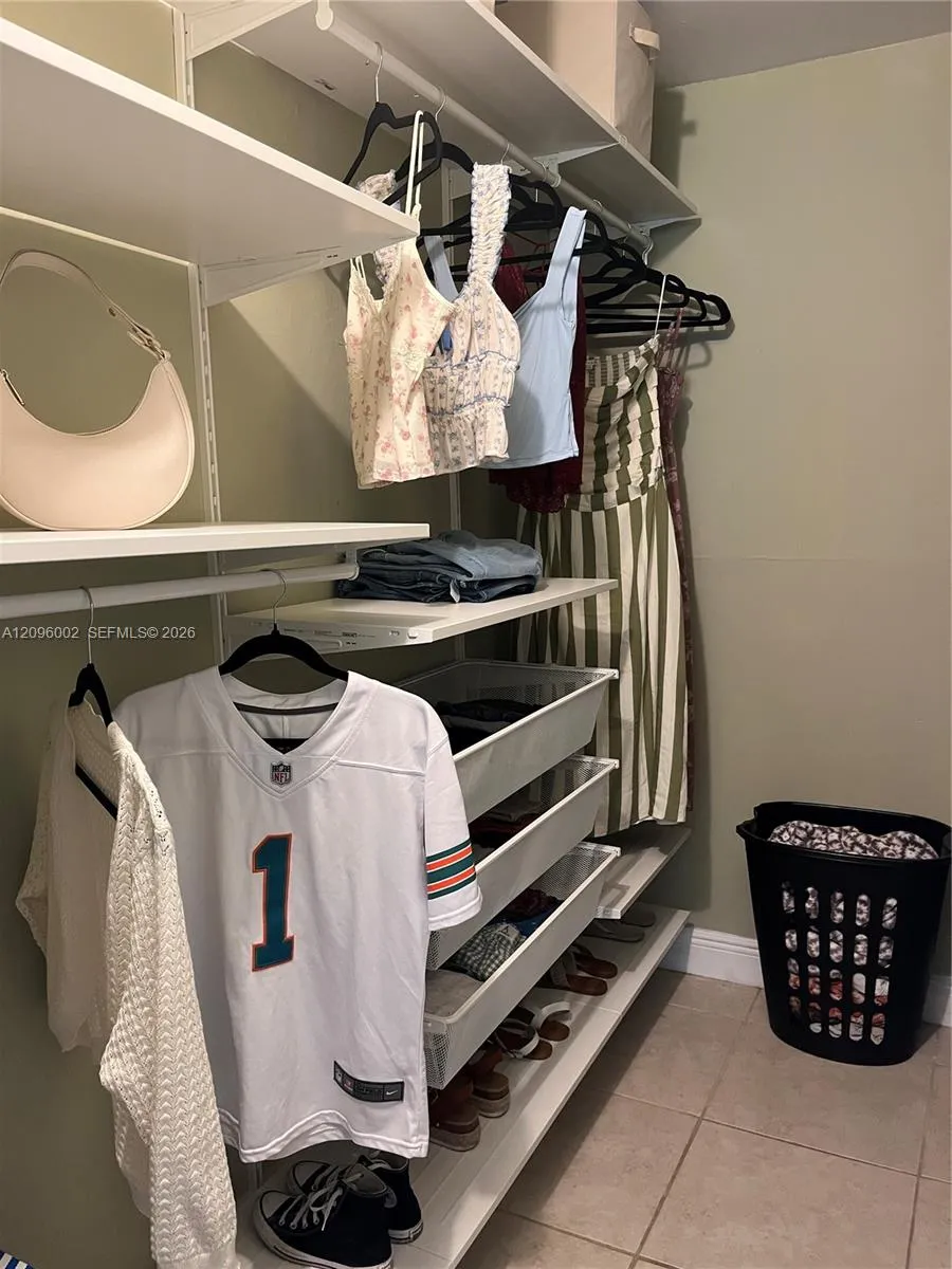 PRIMARY BEDROOM CLOSET
