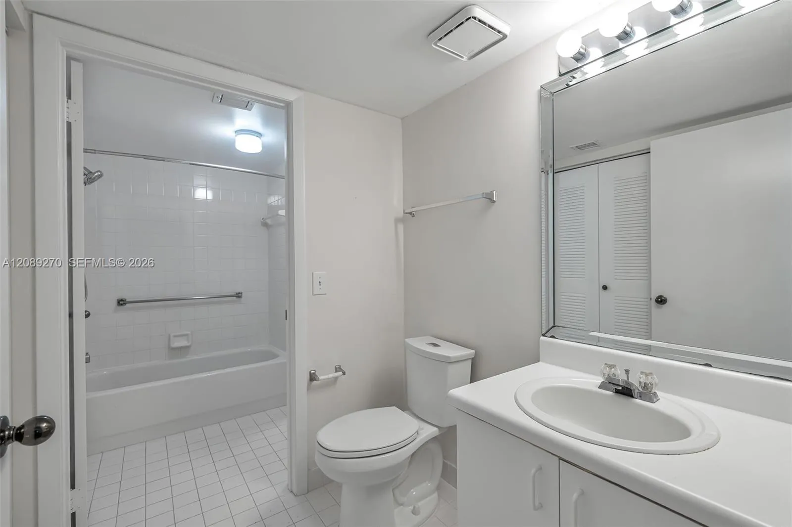 HALF BATH LEADING TO TUB/SHOWER