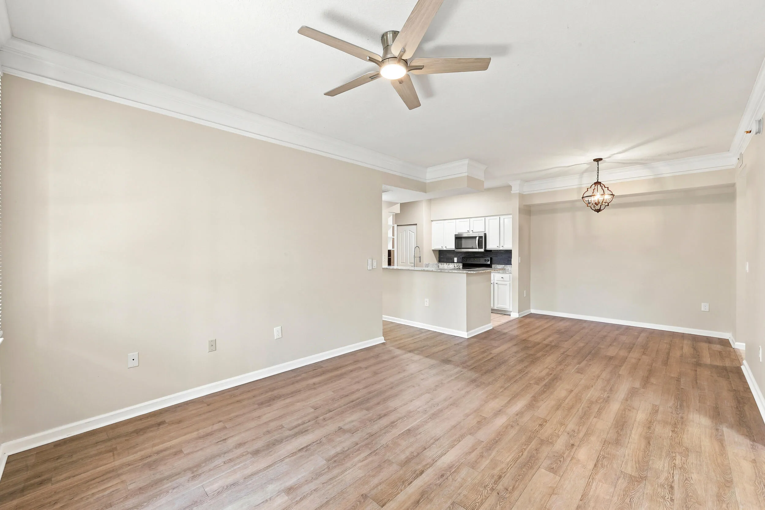 Living Room/ Dining / Luxury Vinyl/ Crown Molding