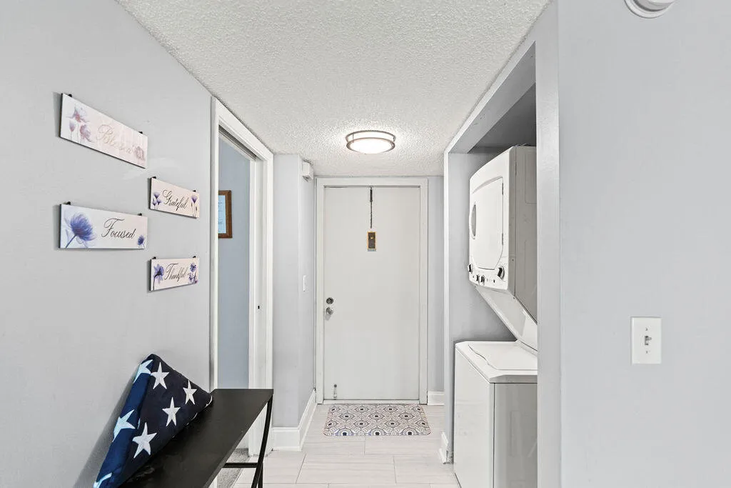 Via Poinciana entrance laundry