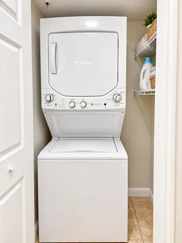Washer and dryer located in the hallway closet.