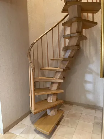 Spiral Staircase to the upstairs loft & bedroom with ensuite bathroom