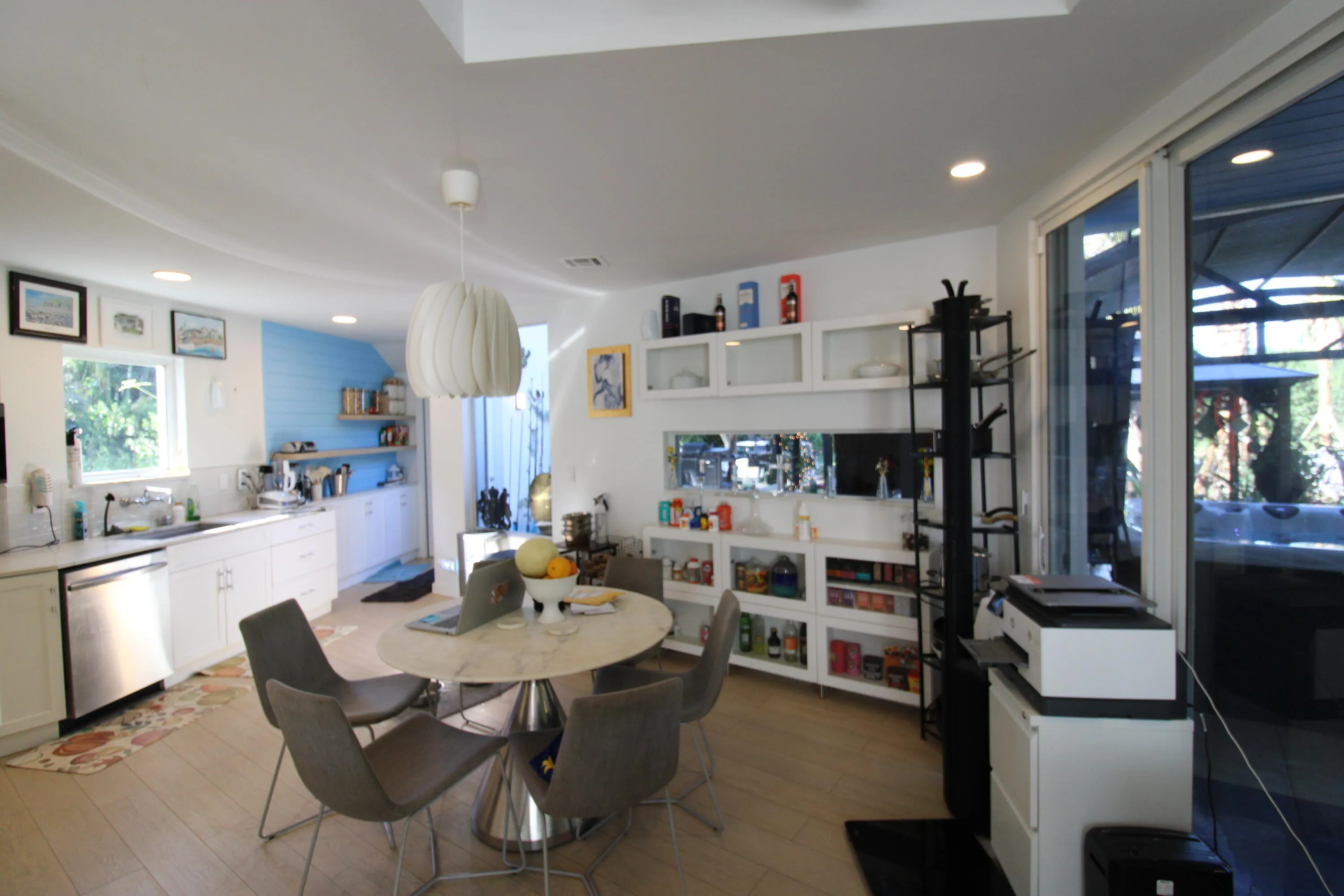 Kitchen leading to North patio leisure complex with Terracotta marble flooring