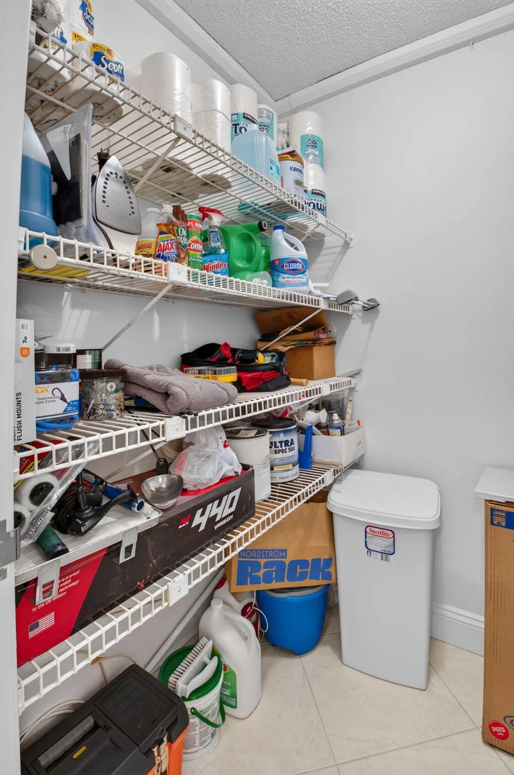 A big, walk-in hallway closet stores all your essential and then some!
