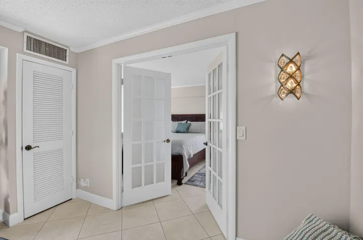 Double French door entry into 2nd bedroom