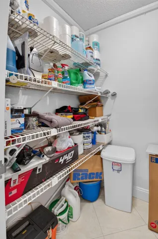 A big, walk-in hallway closet stores all your essential and then some!