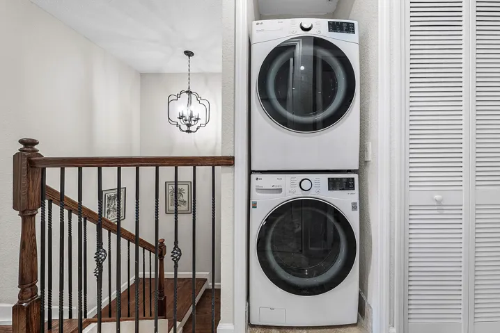 Dedicated laundry closet with stacked appliances