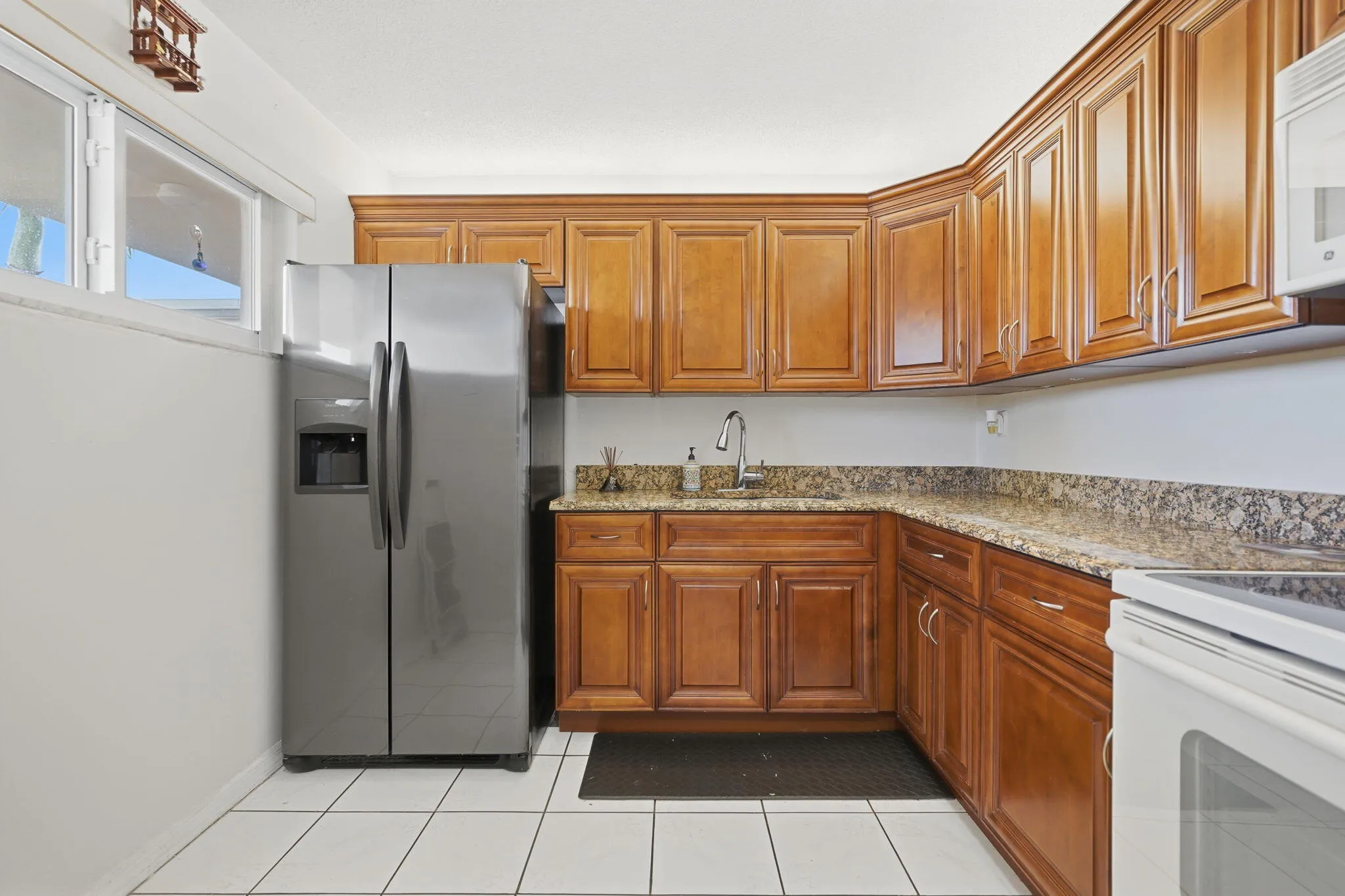 Updated kitchen with granite countertops