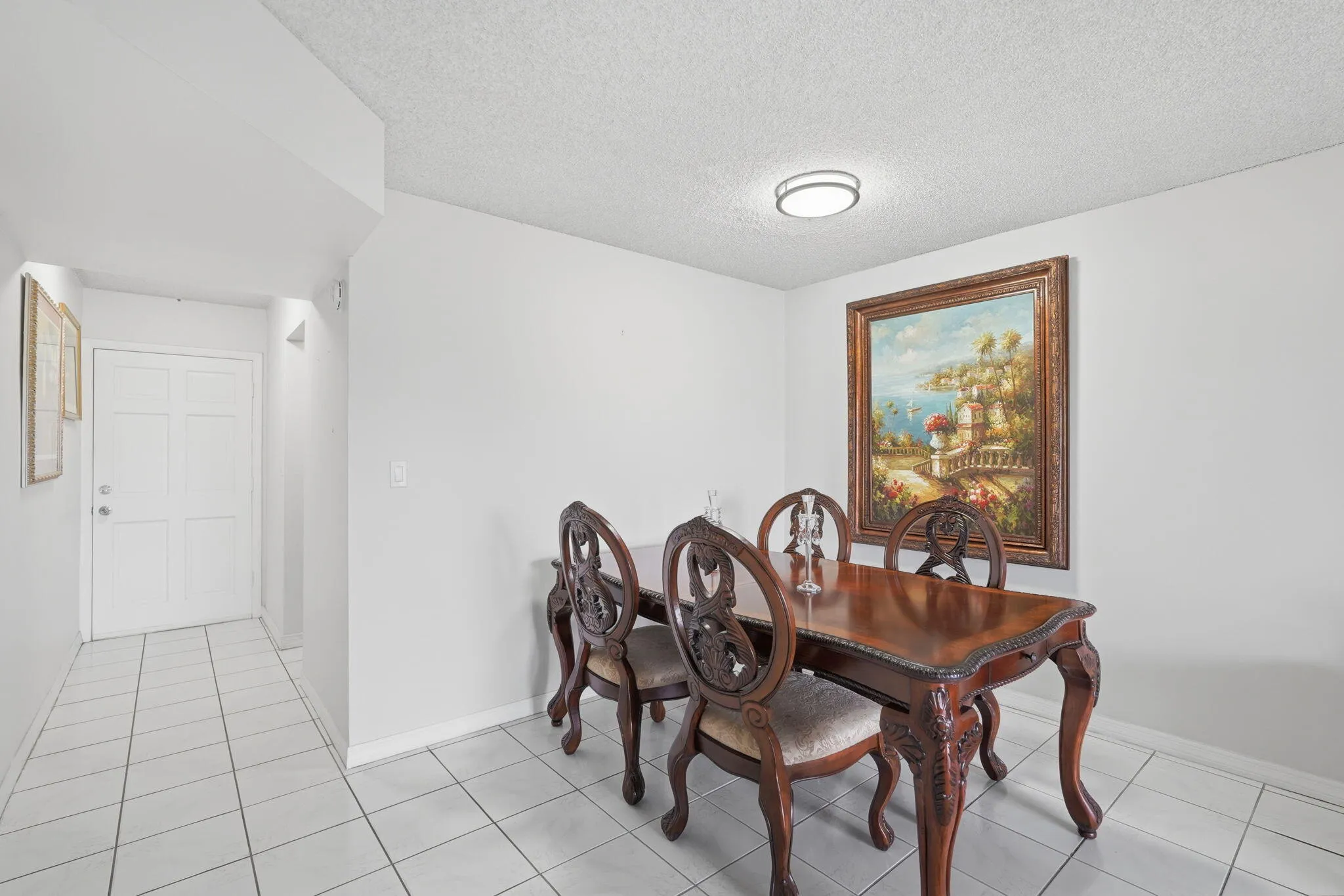 Dining room and entry foyer (kitchen is behind that wall)