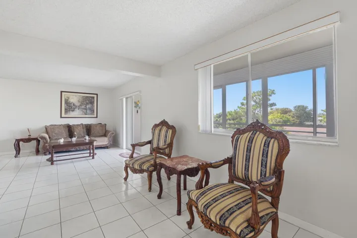 Second bedroom/den with windows out to balcony