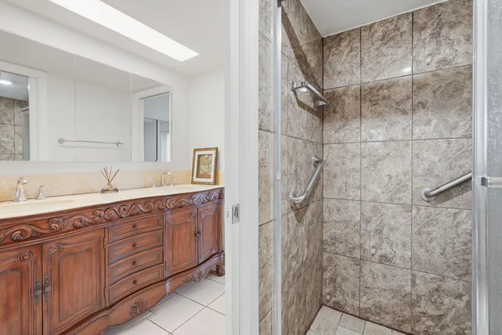 Bathroom with updated and upgraded shower and vanity