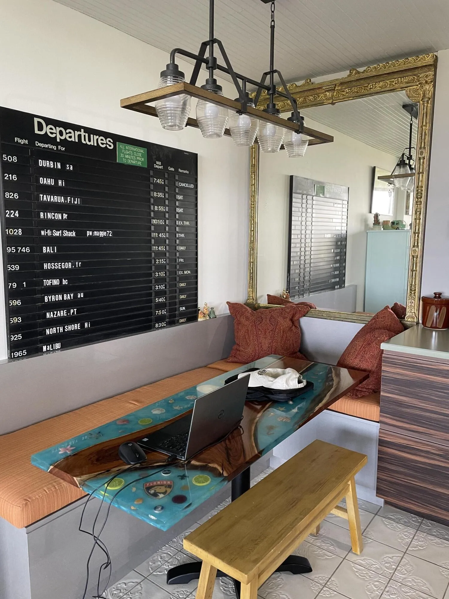 Built-in banquette seating with upholstered cushions