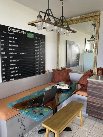Built-in banquette seating with upholstered cushions