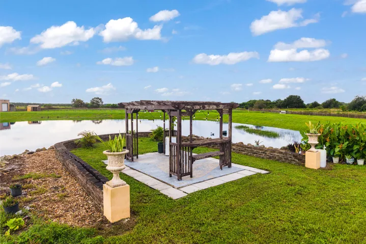 Beautiful gazebo next to the private pon