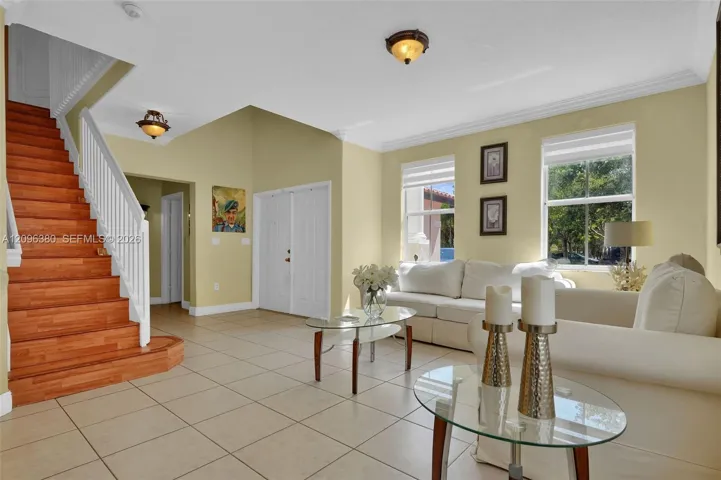 LIVING ROOM ANGLE TOWARD ENTRANCE/STAIRS
