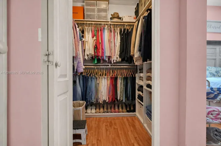 HIS/HER CLOSET PRIMARY ROOM