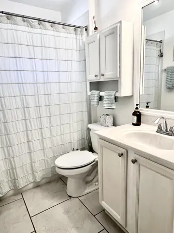 Second bathroom has a shower/tub combo