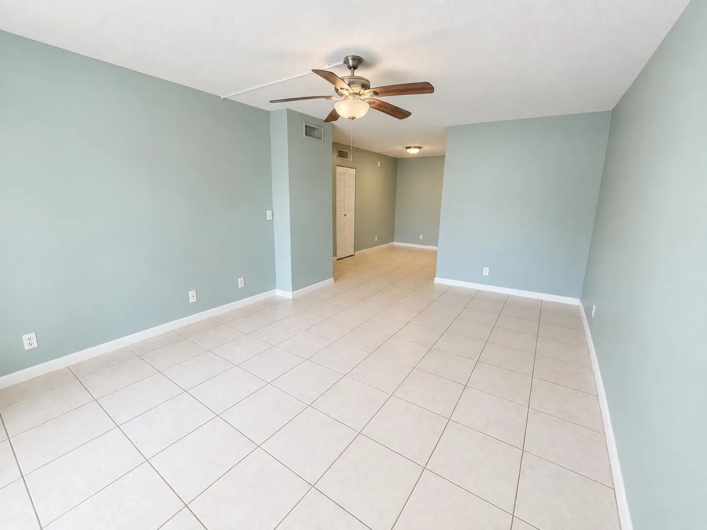 Entryway View/ Living Room Dining Room