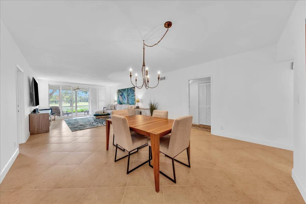 Spacious dining area with an open entryway