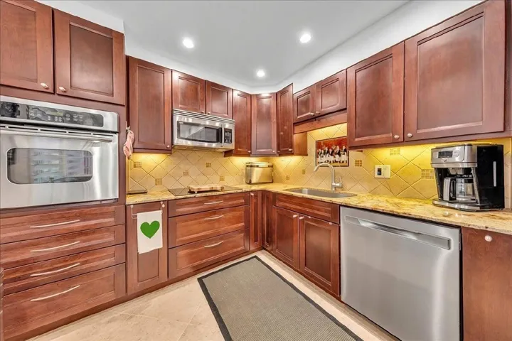 Notice the spice rack to the right of the new dishwasher