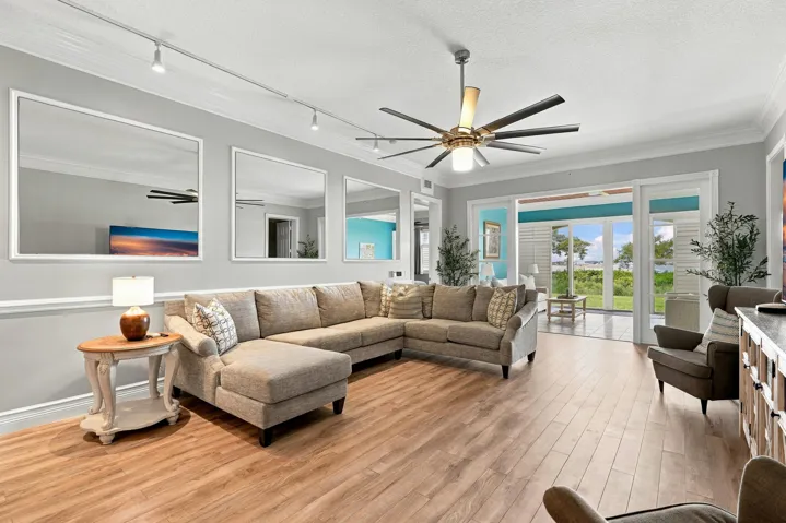 Living area has custom mirrors which make home feel even more spacious and allows you to see marina/water views from multiple locations.
