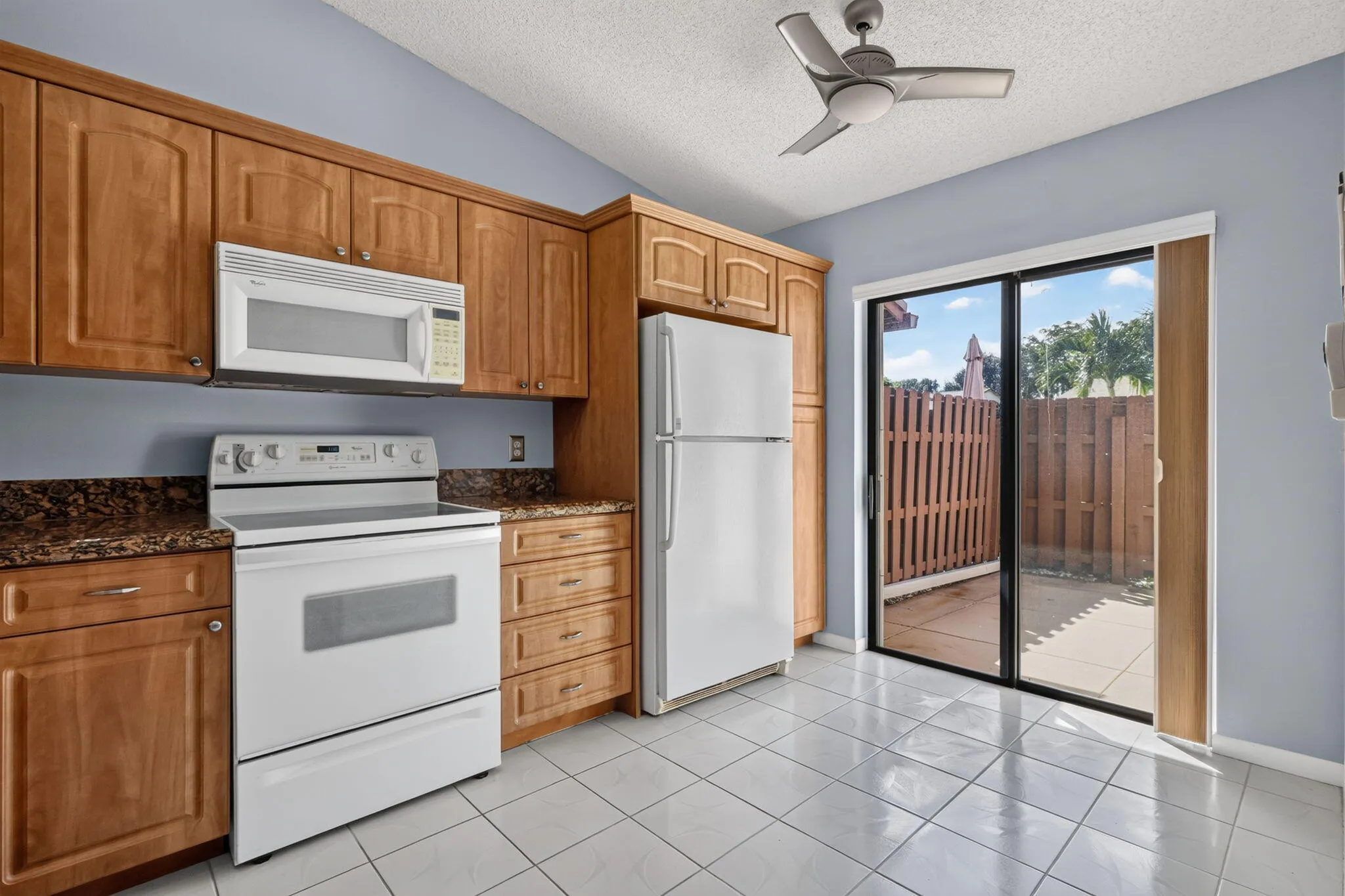 Eat in kitchen, opens to court yard.