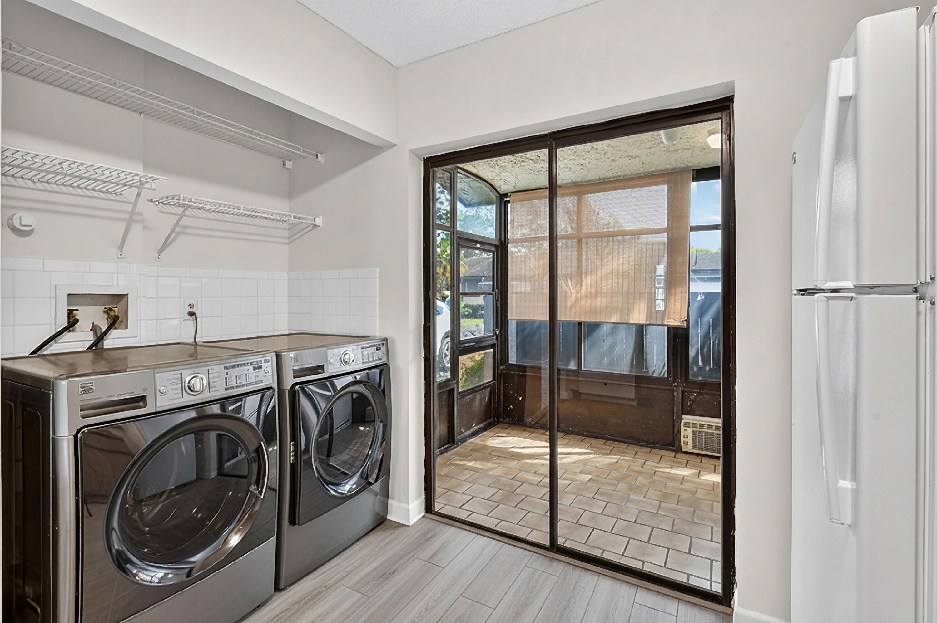 Opens to small closed in patio.