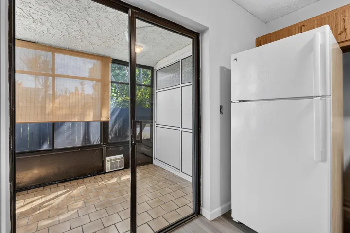 Closed patio, wall of storage closet.