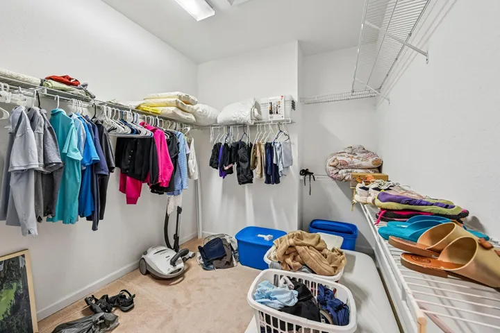 Recessed lighting with wire shelving and hanging rods