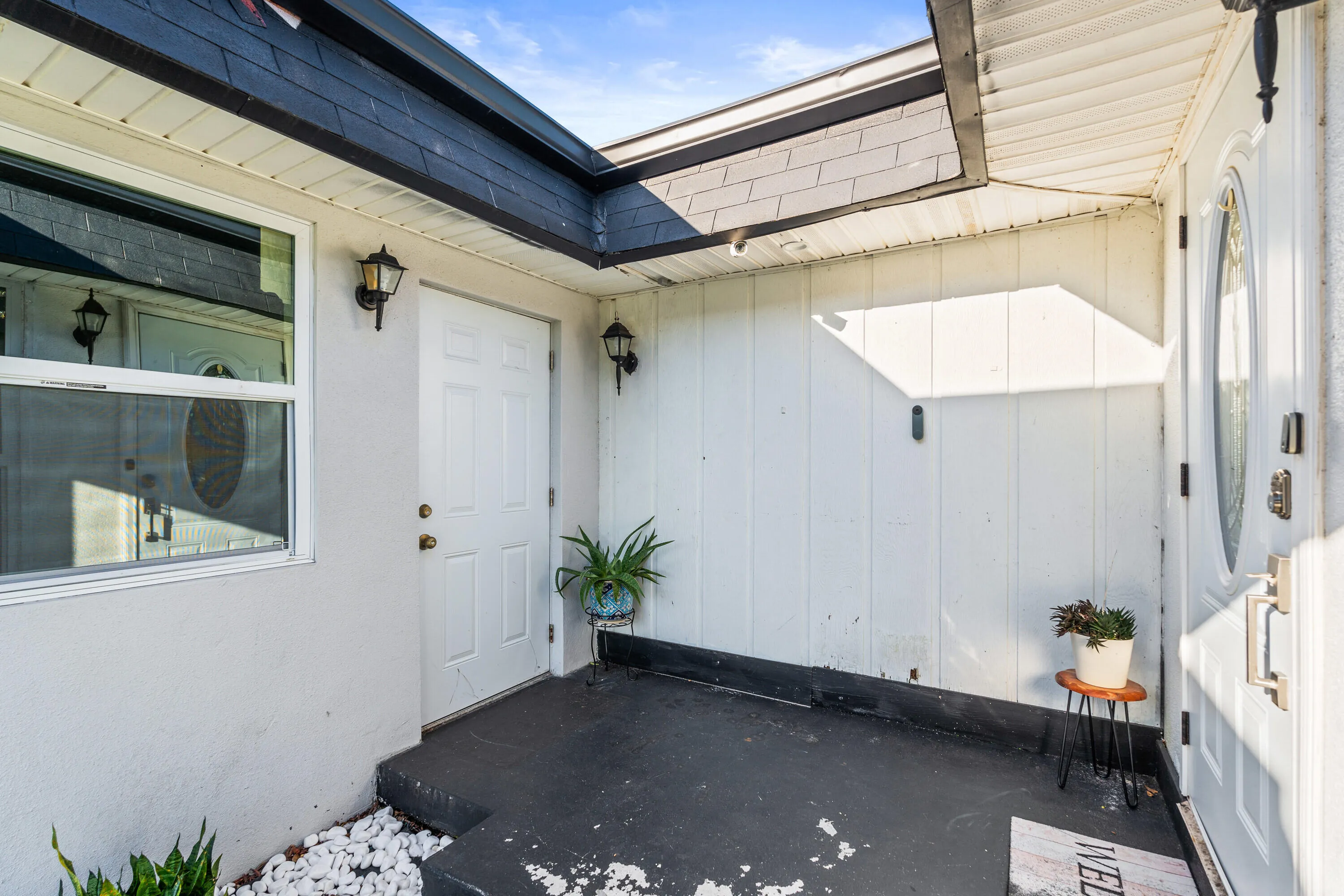 Covered and Private Front Courtyard.