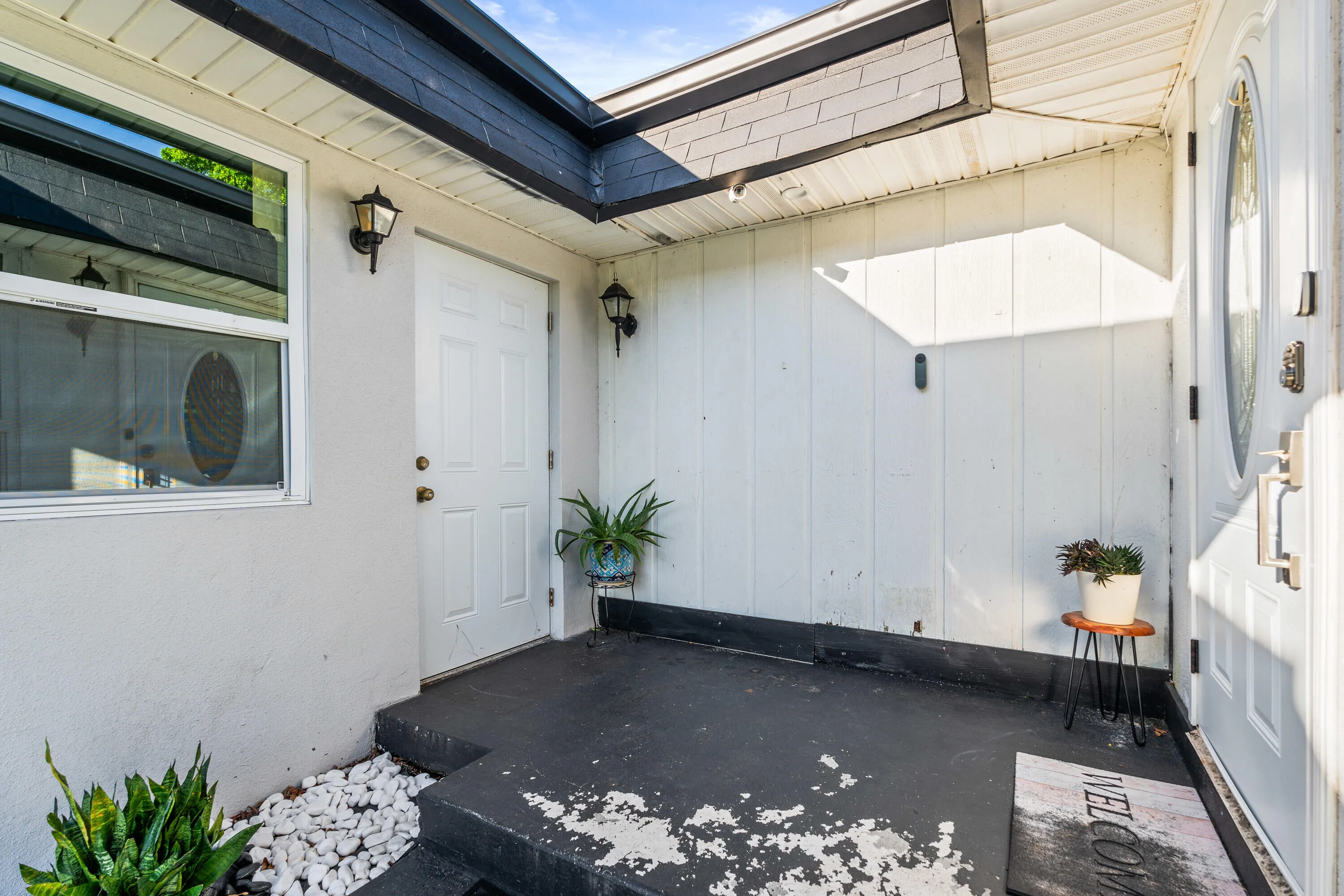 Private Front Courtyard. Garage Entry
