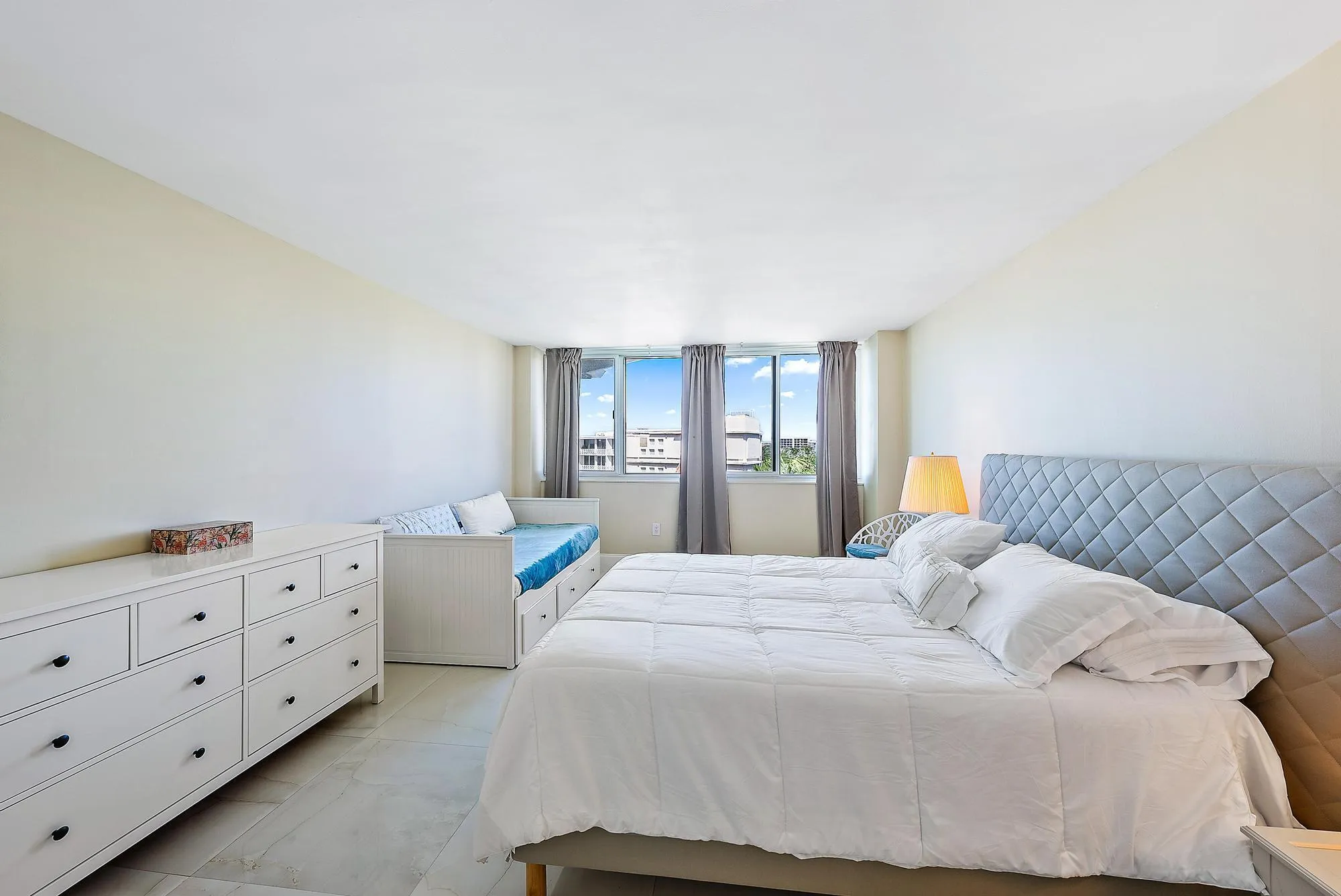 White walls with light-colored flooring