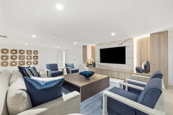 Built-in media center with a marble-finish accent wall