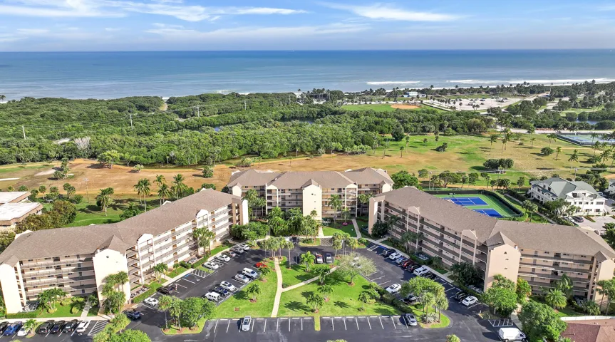 Birds eye view of Jupiter Bay East and the Atlantic Ocean Building "A" is on the right