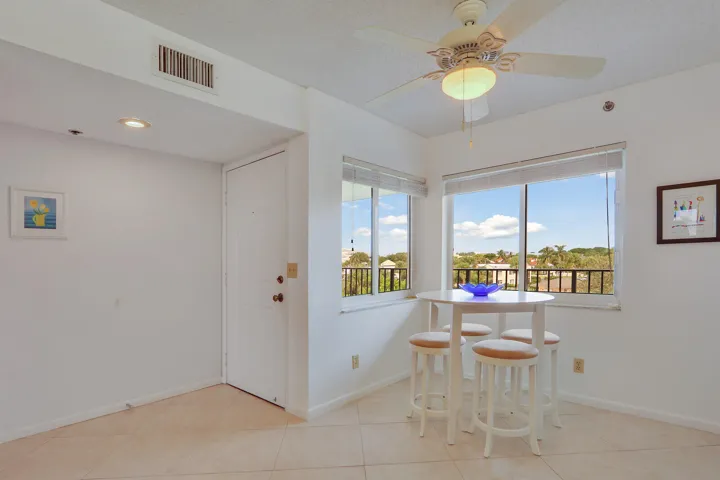 Eat-in kitchen with view of East Pool and Sunsets