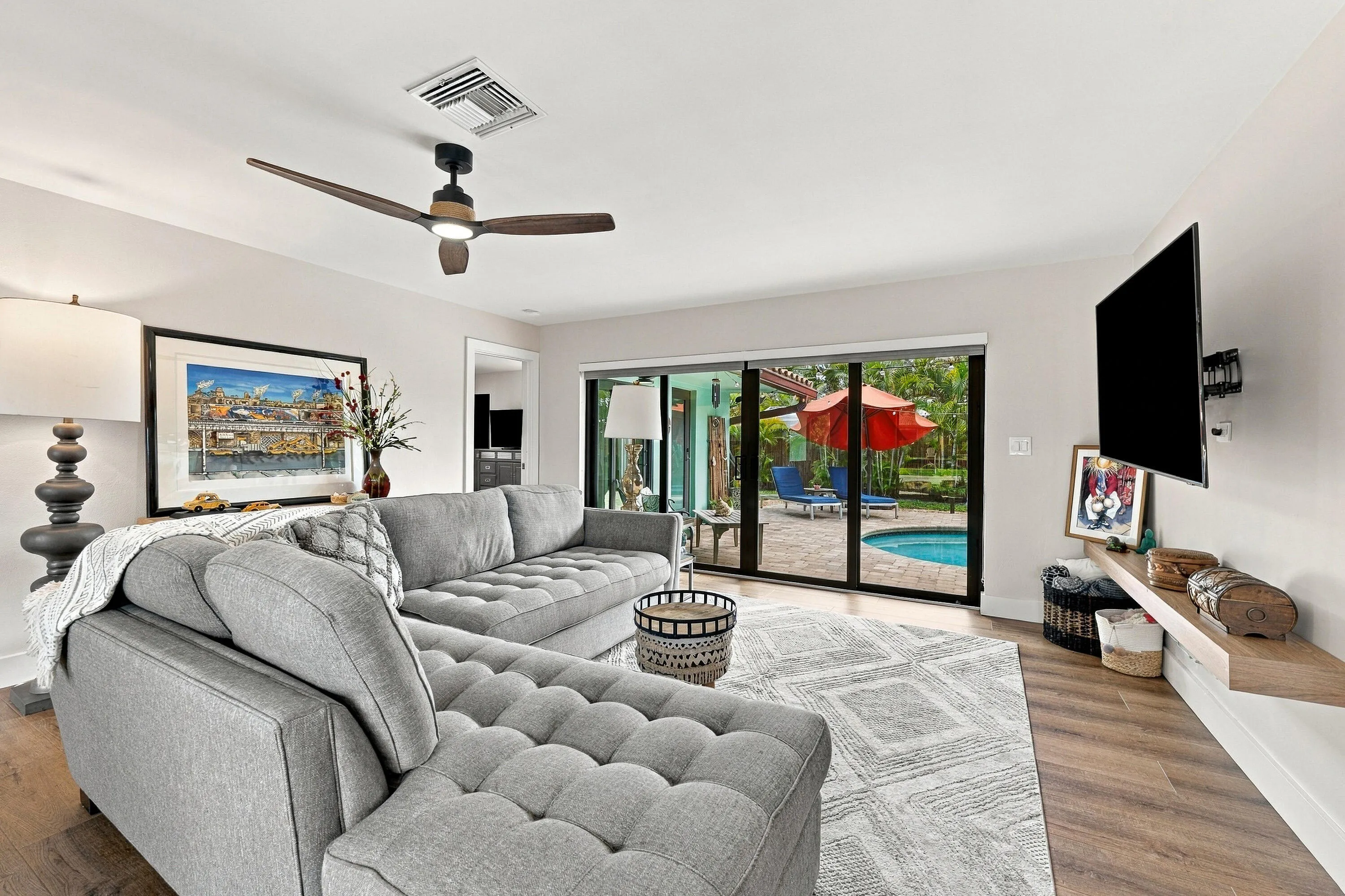 Main Living area access to pool/patio and primary bedrrom/bath