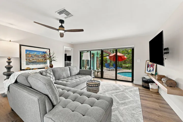 Main Living area access to pool/patio and primary bedrrom/bath