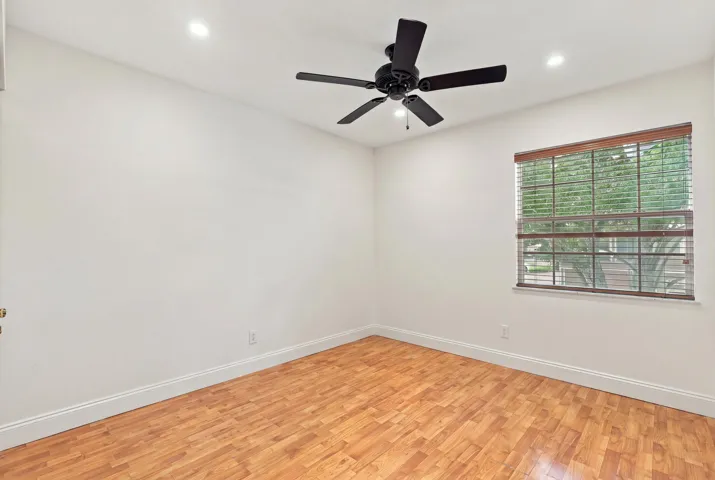 Both upstairs guest bedrooms are generously sized and filled with natural light, offering ample closet space and comfortable accommodations for family, overnight guests, or a growing household.