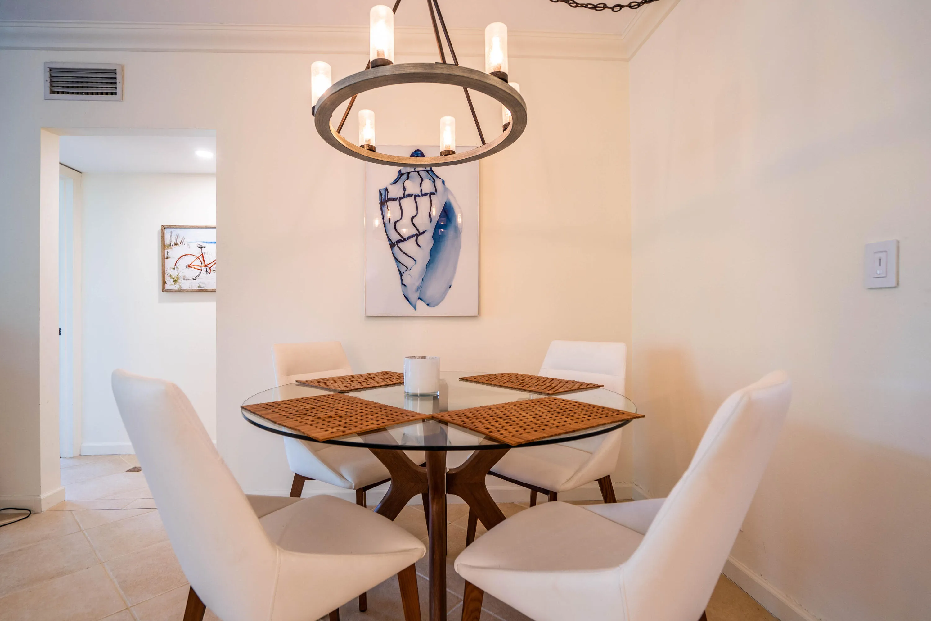 Recessed ceiling lighting, crown molding, and tiled flooring