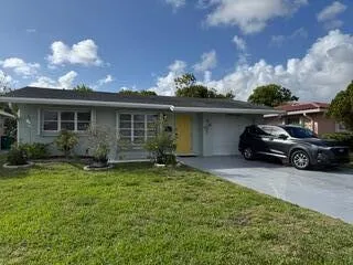 Beautiful Single-story residence featuring oversize concrete driveway parking for 4