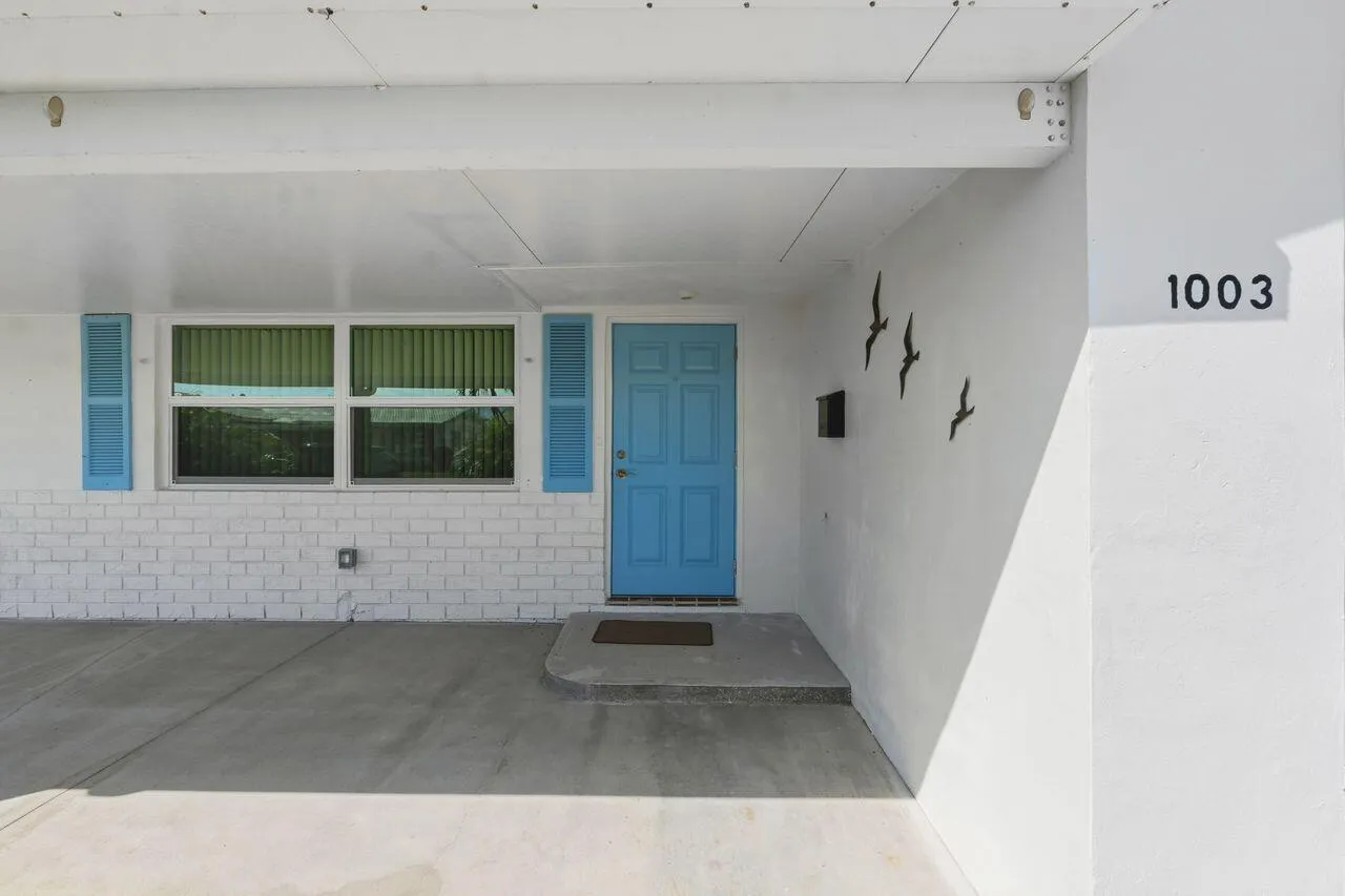 Covered entryway with concrete flooring