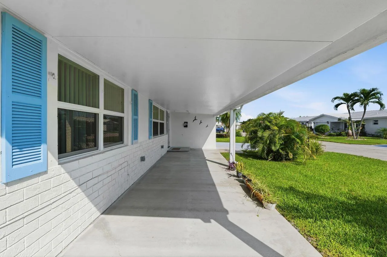 Newly added covered front porch with metal roof. perfect for morning coffee or just relaxing with friends