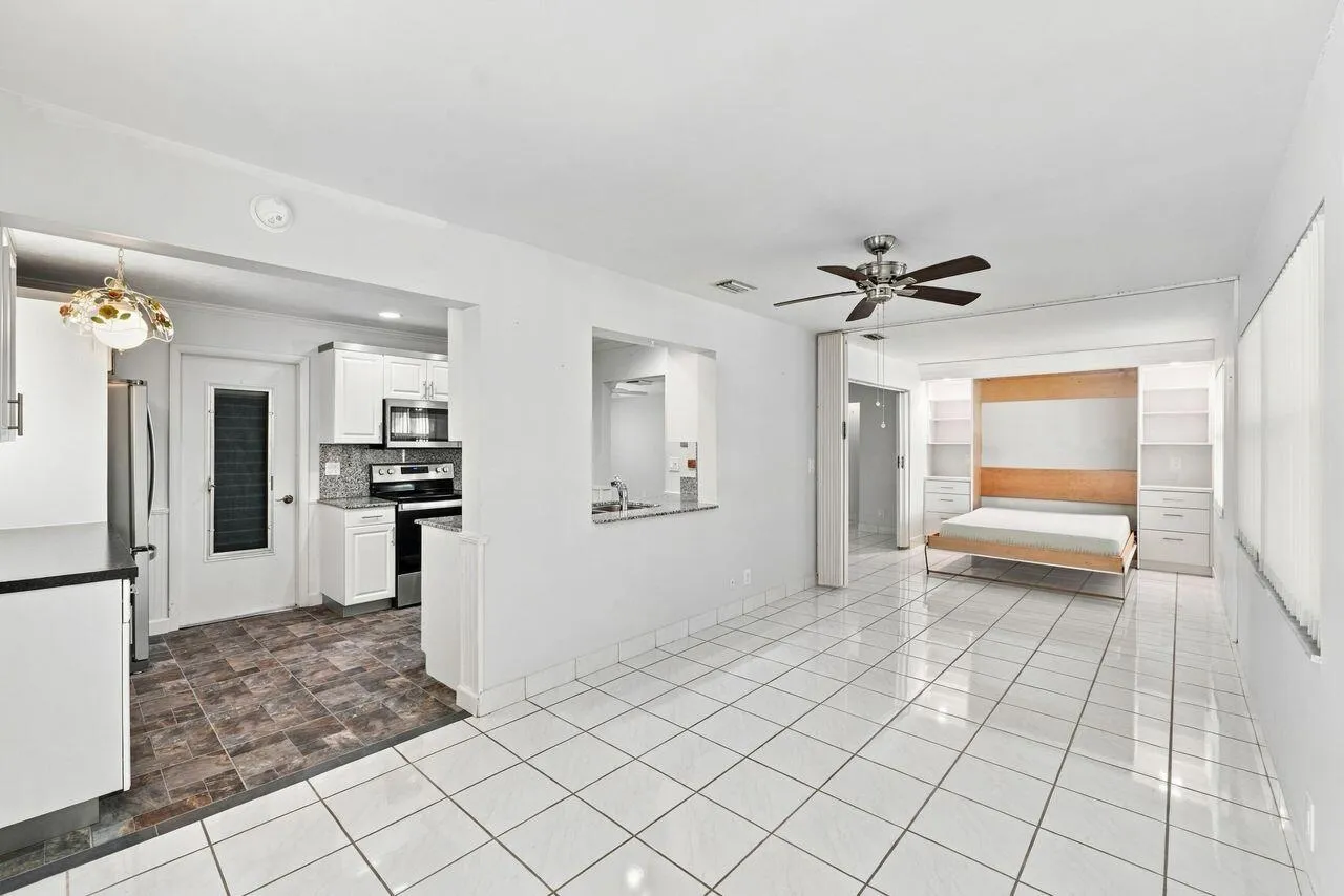Wonderful living space with built in Murphy bed at one end and plenty of dining area