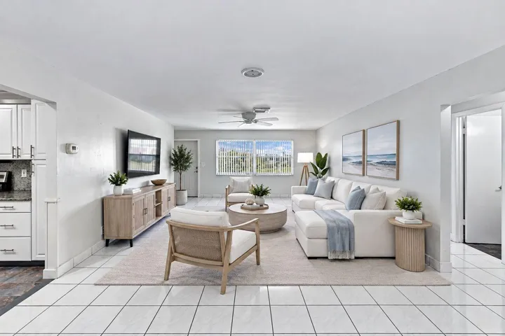 Light and bright large living room area (Virtually staged)