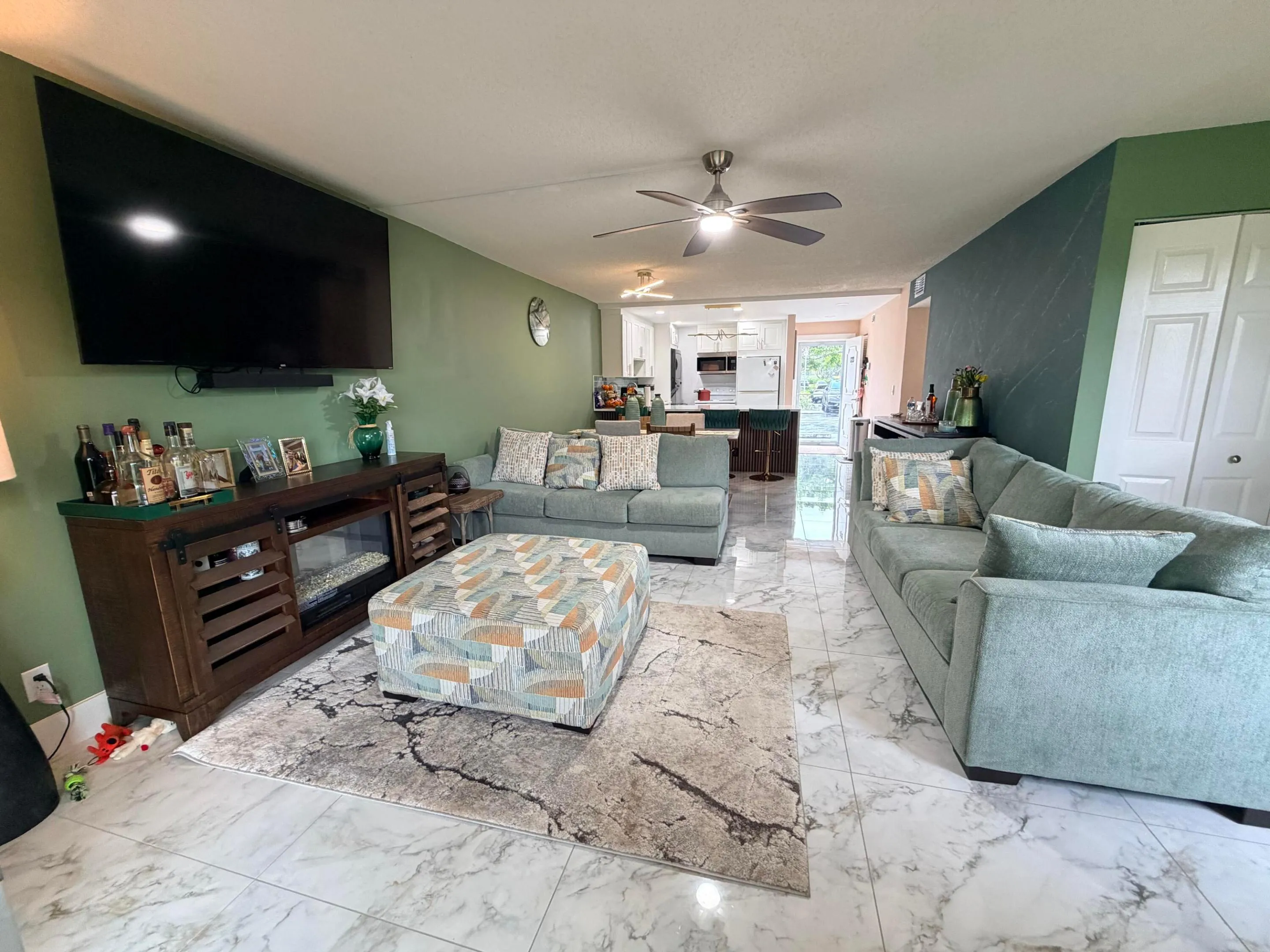 Living room to dining area to kitchen