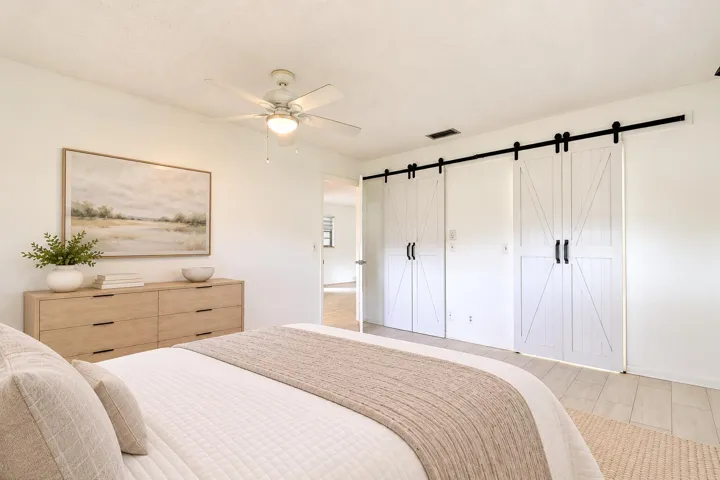 White walls with wood-finish flooring