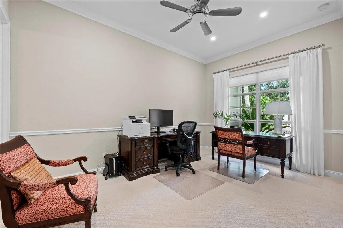 This bedroom / office has it's own full bathroom with a walk in shower.