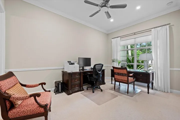 This bedroom / office has it's own full bathroom with a walk in shower.