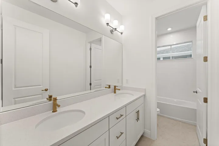 Stock photos represent builder's floorplan