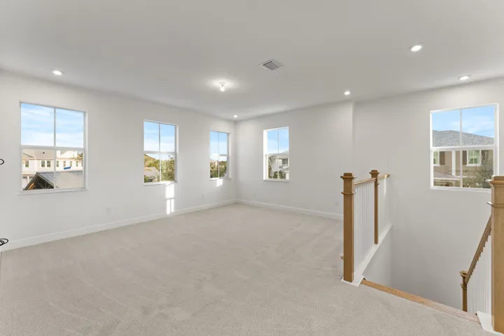 Stock photos represent builder's floorplan